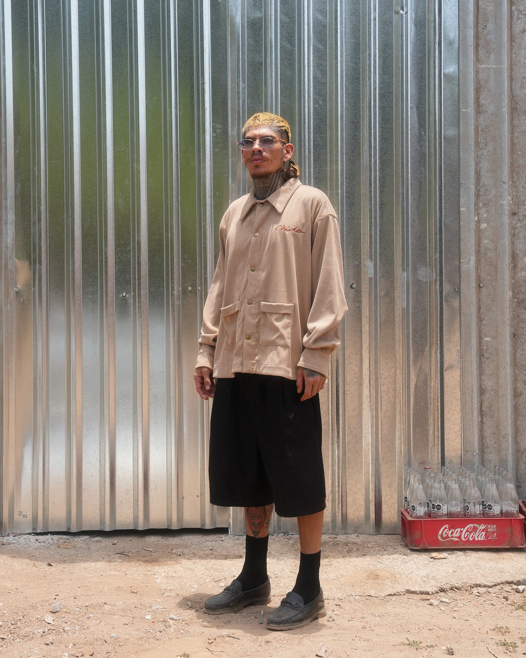 Model wearing beige corduroy jacket by CHIDO
