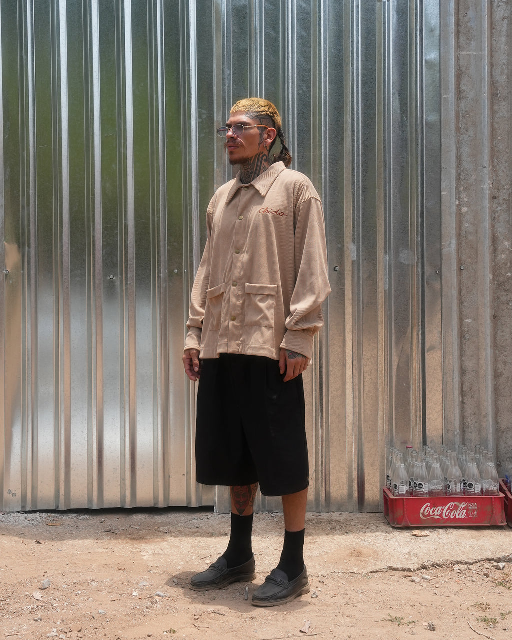 Side view of beige corduroy jacket streetwear outfit