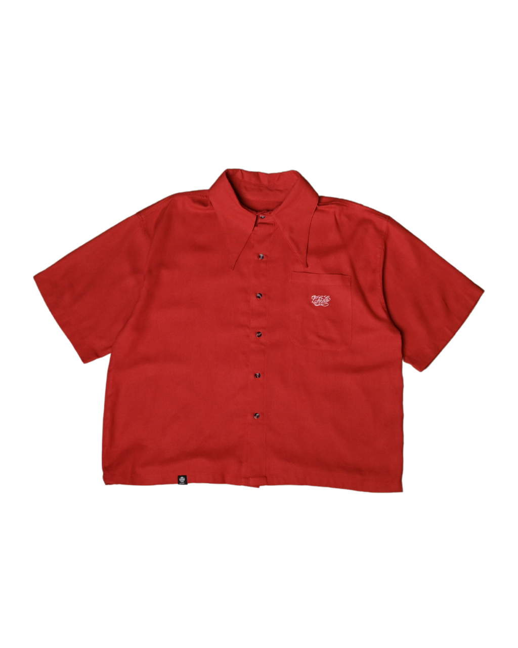 Vista frontal de la camisa boxy roja Amá Chola de CHIDO.